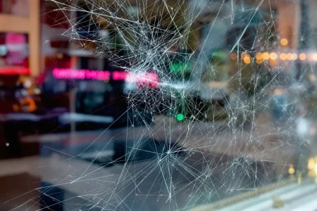 Scratched glass before we performed glass restoration service