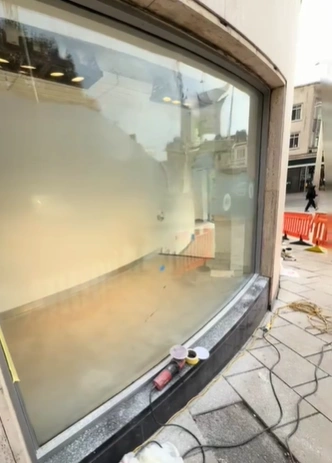Shop vitrine in London glass restoration in process
